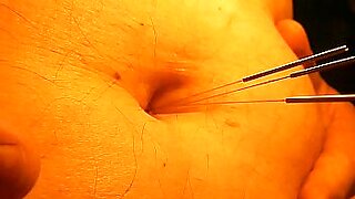 nude extreme masochist long needles through tits