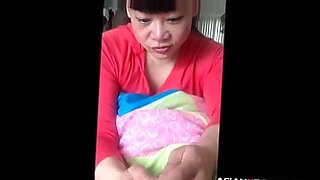 son gives massage to his mom