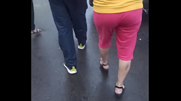 white girl walking in loose booty shorts