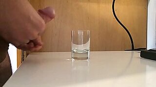 foxy ebony honey filling a glass with urine