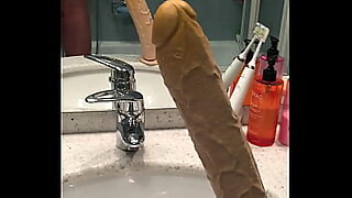 black hood ghetto bitch sucking the dildo