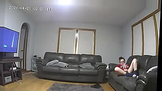 mom and son at kitchen spy cam