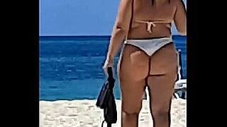 voyeur cameraman finds beautiful brunette fantastic boobs nude beach